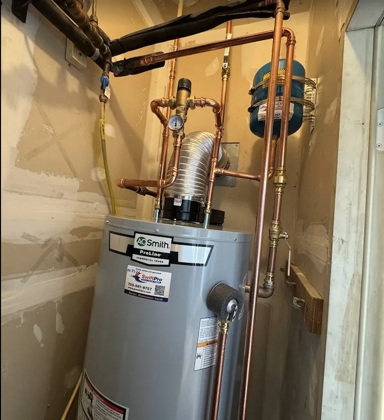 A new A.O. Smith water heater SwiftPro installed with copper connections
