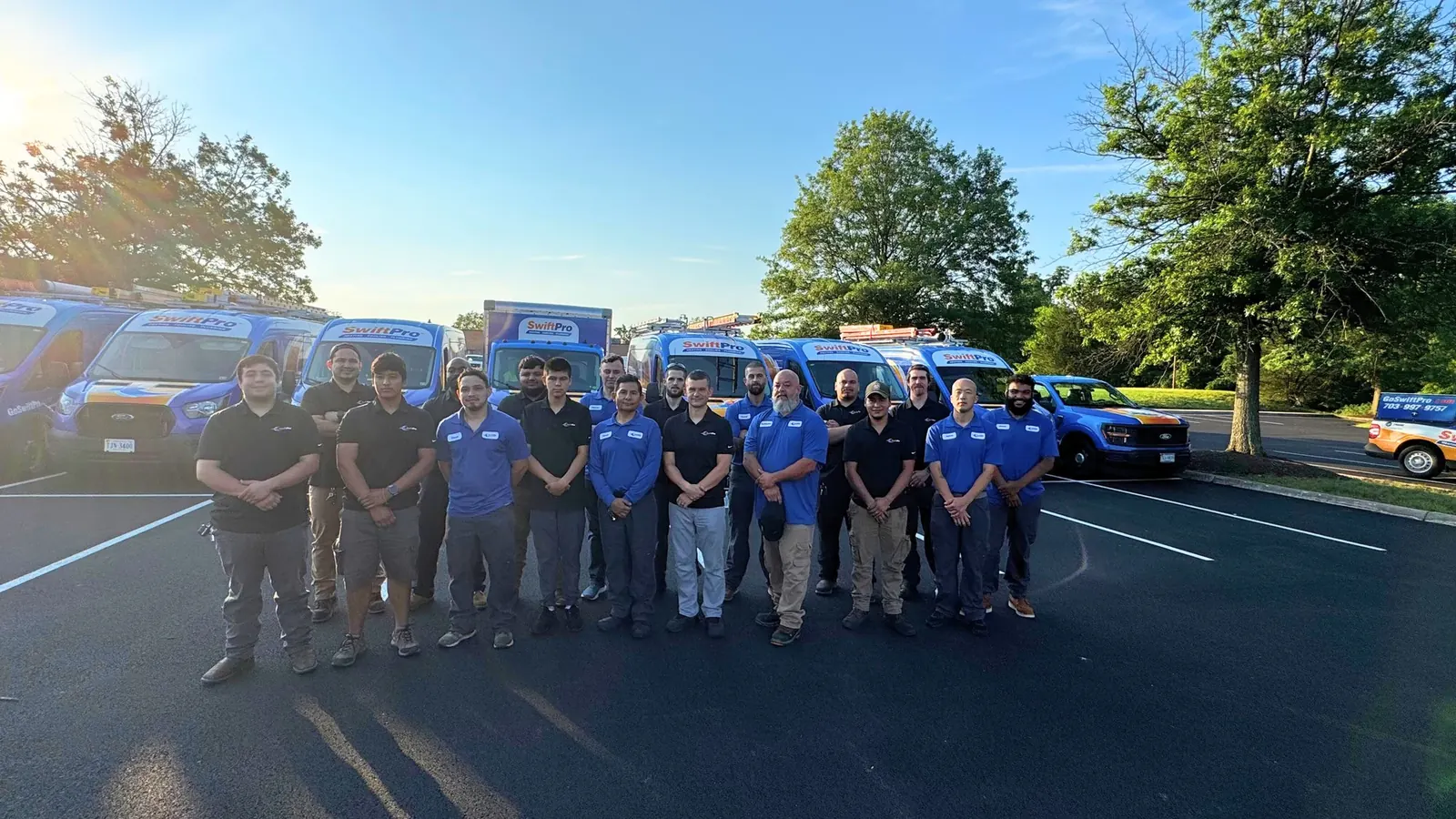 The SwiftPro crew with their vans